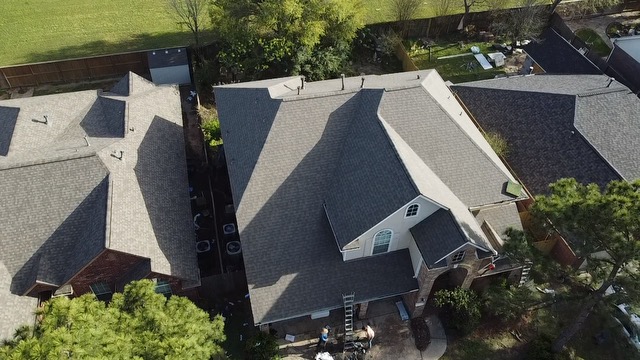 Finished residential roofing project by Home Team Home Solutions